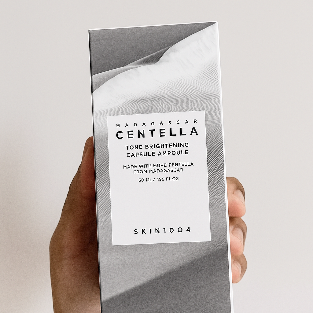Brightening ampoule with Centella, niacinamide, and adenosine that fades dark spots and boosts radiance for luminous, even-toned skin.