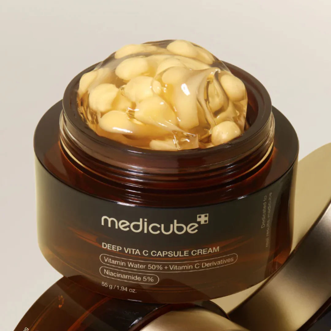 Vitamin C cream with brightening capsules that hydrates, evens skin tone, and enhances radiance while protecting against oxidative stress.